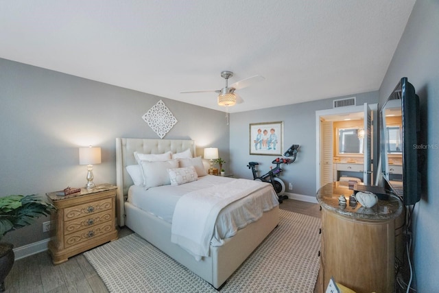 bedroom featuring hardwood / wood-style flooring and ceiling fan