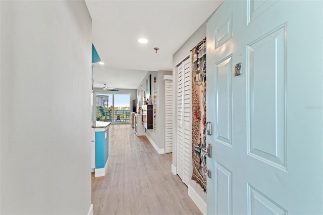 hall featuring light hardwood / wood-style floors