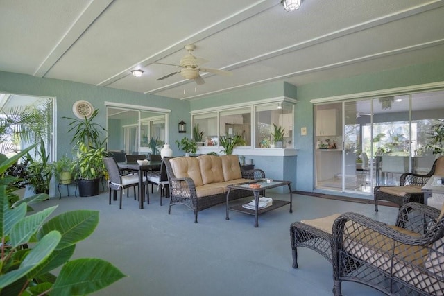 sunroom / solarium with ceiling fan