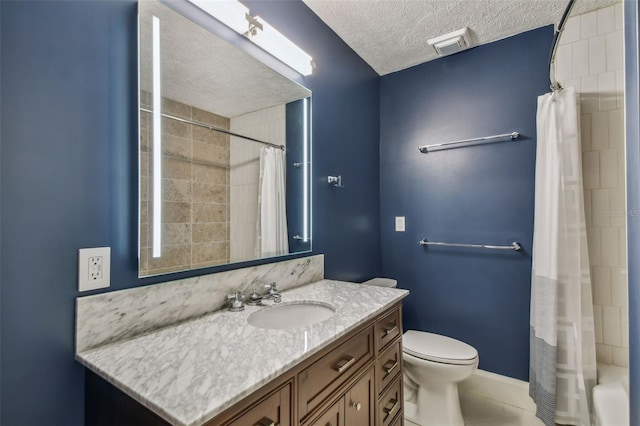 full bathroom featuring shower / bath combination with curtain, tile patterned floors, vanity, a textured ceiling, and toilet