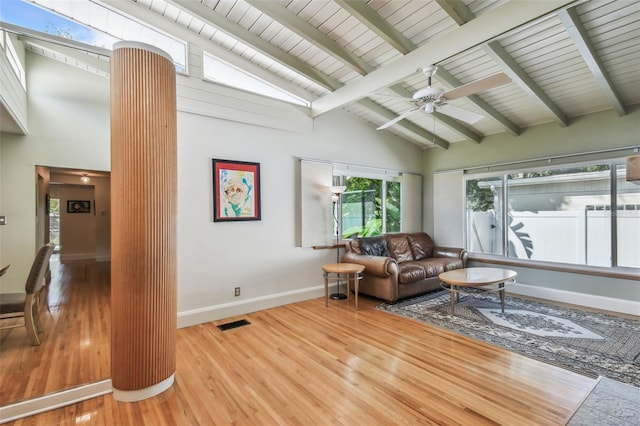 living room featuring wooden ceiling, ceiling fan, beam ceiling, high vaulted ceiling, and light hardwood / wood-style flooring