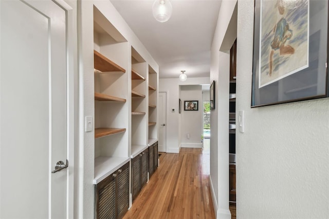 hallway featuring light hardwood / wood-style floors