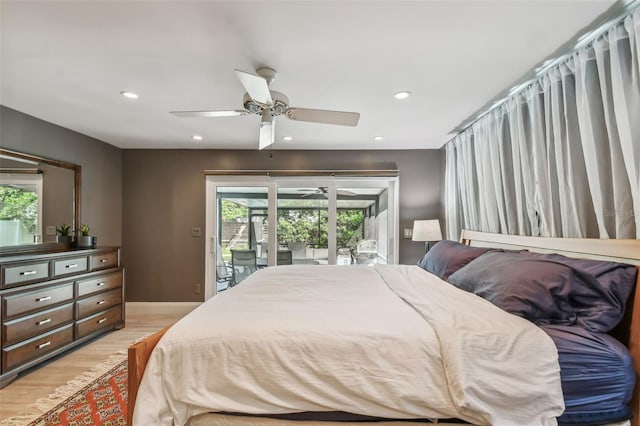 bedroom with ceiling fan, multiple windows, light hardwood / wood-style flooring, and access to outside