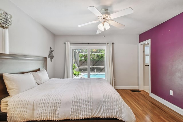 bedroom with ceiling fan, access to exterior, and light wood-type flooring