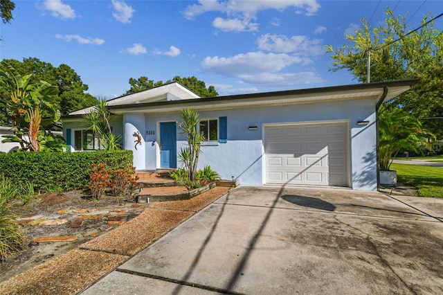 ranch-style house with a garage