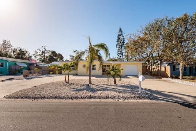 single story home with a garage