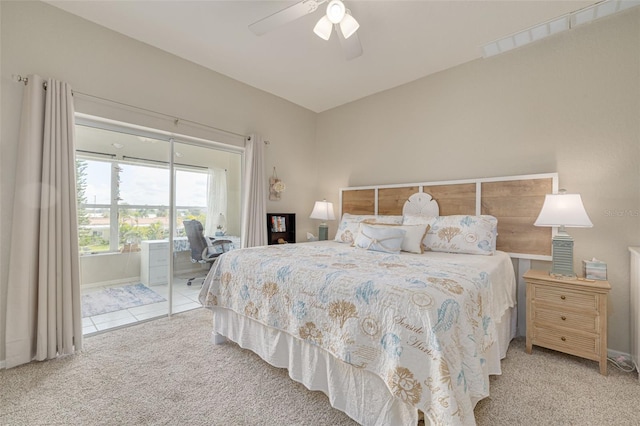 bedroom featuring light carpet, ceiling fan, and access to outside