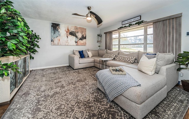 living room with ceiling fan and hardwood / wood-style floors