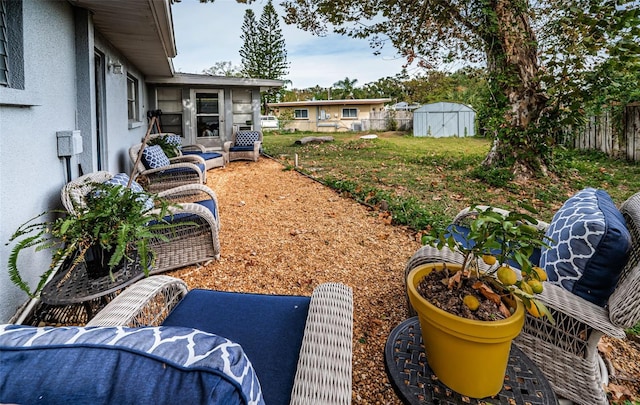 view of yard with a storage shed