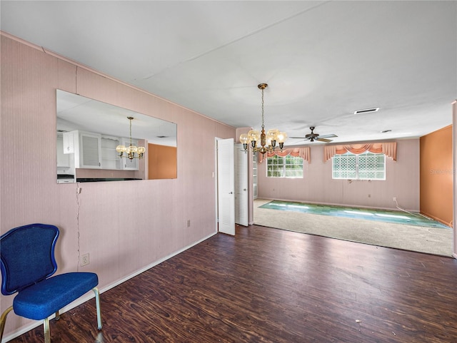 interior space with ceiling fan and wood-type flooring