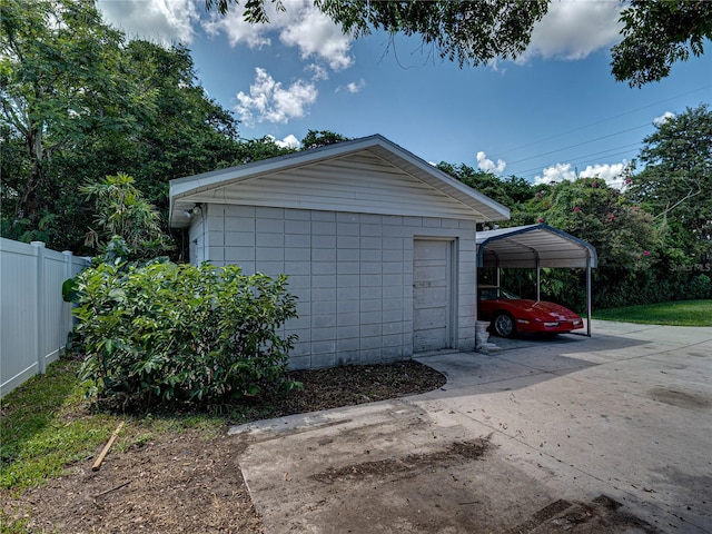 garage with a carport