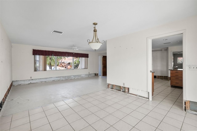 spare room with ceiling fan