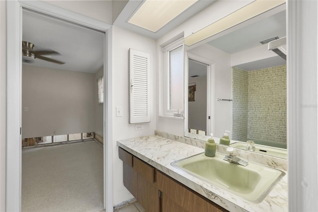 bathroom with vanity and ceiling fan