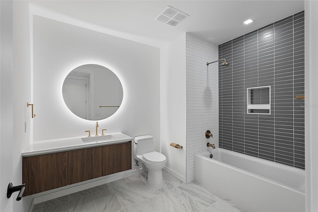 777 3rd Ave N Unit 1203, Saint Petersburg, FL 33701 - bathroom featuring toilet, shower / tub combination, vanity, marble look tile flooring, and baseboards