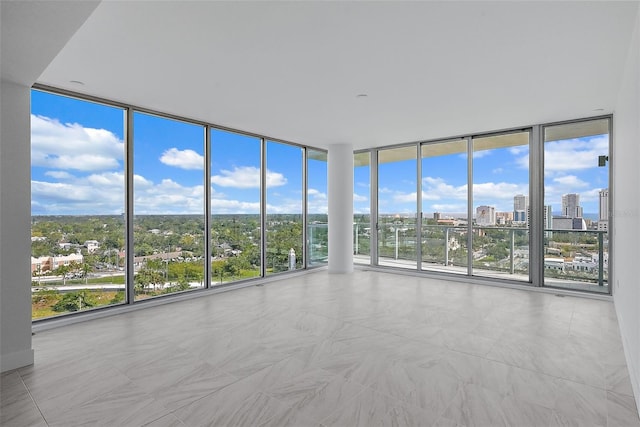777 3rd Ave N Unit 1203, Saint Petersburg, FL 33701 - spare room with floor to ceiling windows and a city view