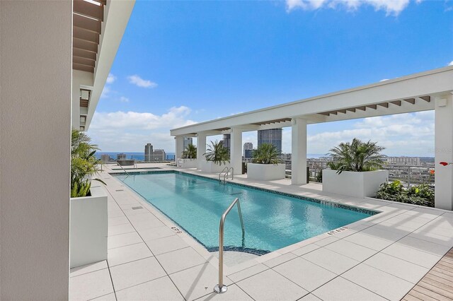 777 3rd Ave N Unit 1203, Saint Petersburg, FL 33701 - community pool with a patio area