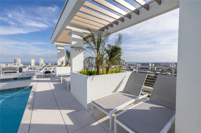 777 3rd Ave N Unit 1203, Saint Petersburg, FL 33701 - view of patio / terrace with an outdoor pool, a pergola, and a city view