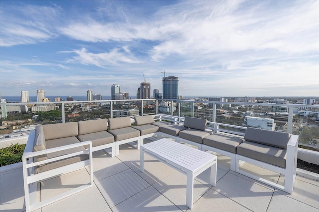777 3rd Ave N Unit 1203, Saint Petersburg, FL 33701 - view of patio featuring outdoor lounge area, a view of city, and a balcony