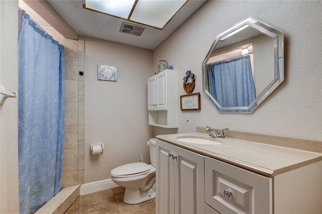 bathroom with a shower with shower curtain, vanity, toilet, and tile patterned flooring