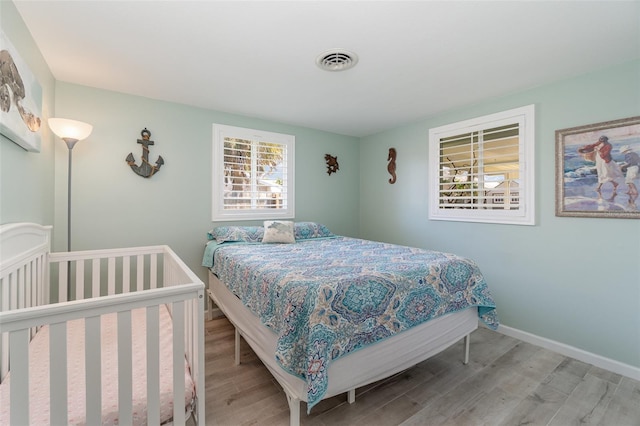 bedroom featuring light hardwood / wood-style flooring