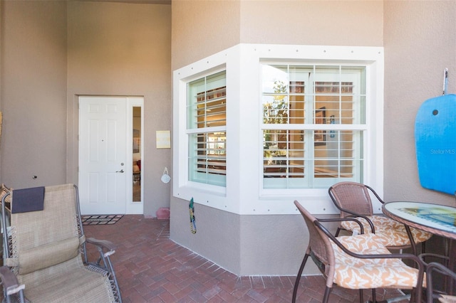 property entrance with a patio area