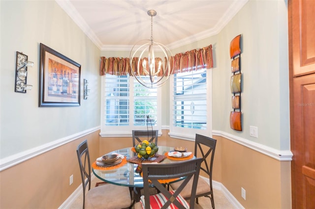 dining room with crown molding and a notable chandelier