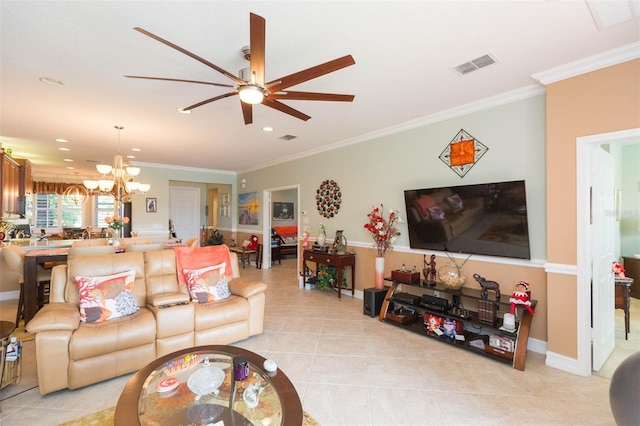 living room with ornamental molding, ceiling fan with notable chandelier, and light tile patterned floors