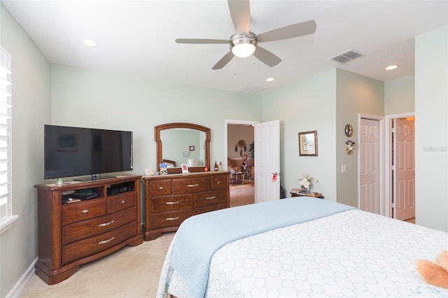 carpeted bedroom with ceiling fan