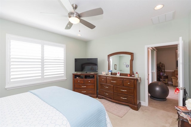 carpeted bedroom featuring ceiling fan