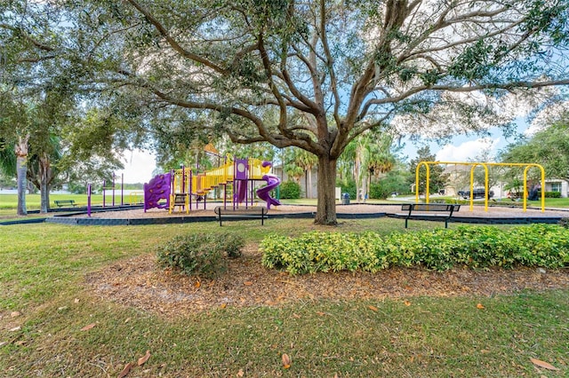 view of jungle gym with a lawn