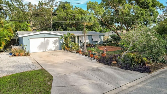 single story home with a garage