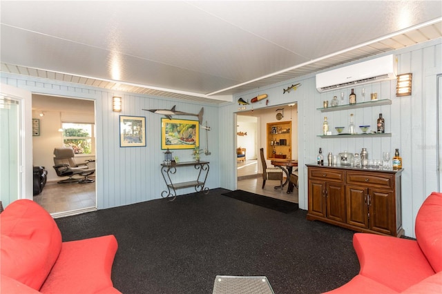 living room featuring wood walls, indoor bar, and a wall mounted air conditioner