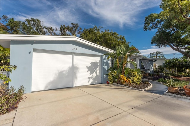 view of property exterior with a garage