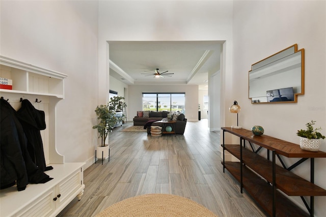 mudroom featuring light hardwood / wood-style flooring and ceiling fan