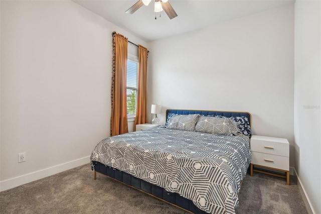 bedroom featuring dark colored carpet and ceiling fan