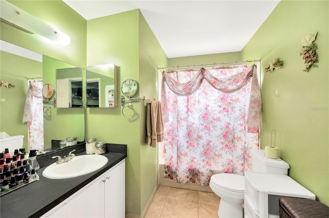 full bathroom with toilet, vanity, shower / bath combination with curtain, and tile patterned floors