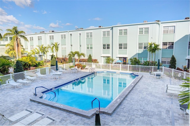 view of pool featuring a patio area