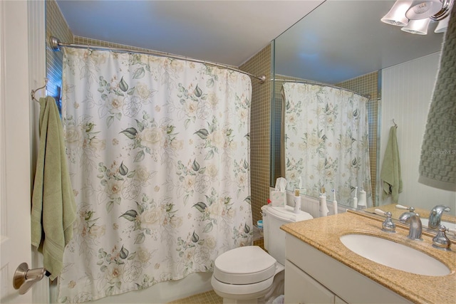 full bathroom with toilet, vanity, and shower / bathtub combination with curtain