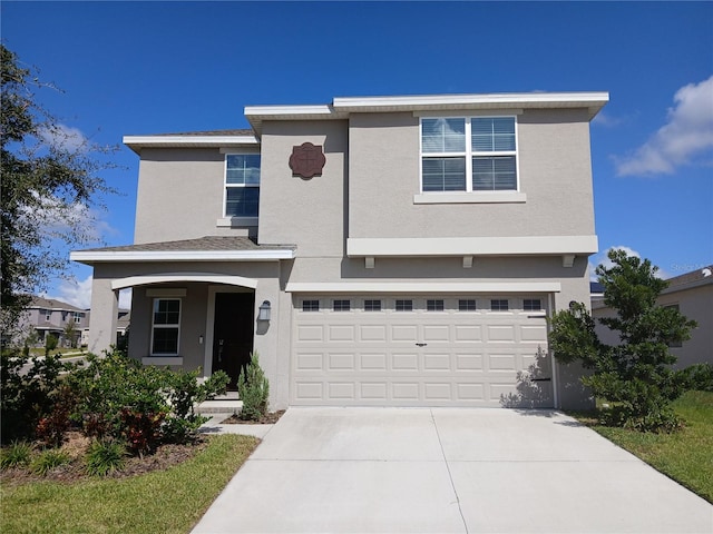 front of property featuring a garage