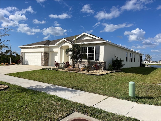 ranch-style house featuring a garage and a front lawn