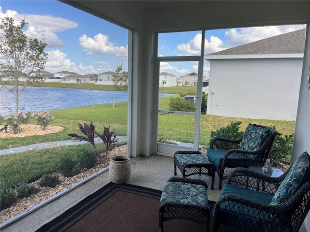 sunroom with a water view