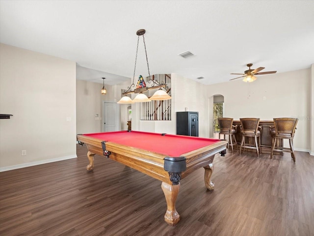 playroom featuring indoor bar, billiards, dark wood-type flooring, and ceiling fan