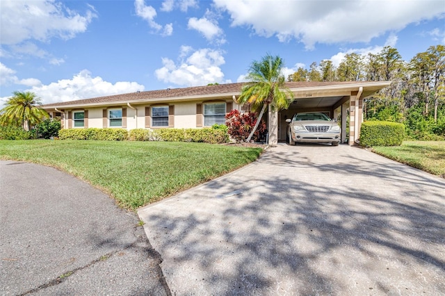 ranch-style house with a carport and a front yard