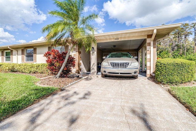 view of front of home featuring a carport