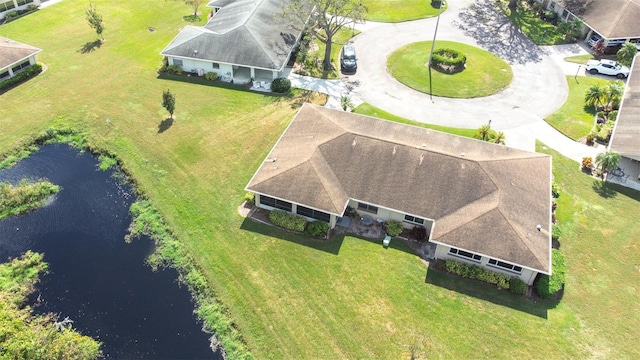 drone / aerial view featuring a water view