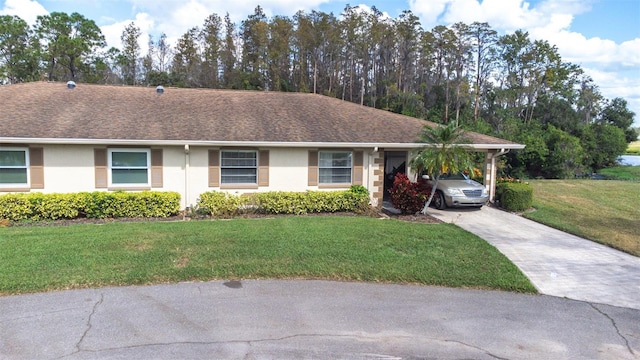 ranch-style house with a front lawn and a carport