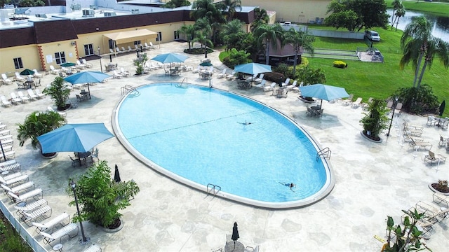 community pool with a patio