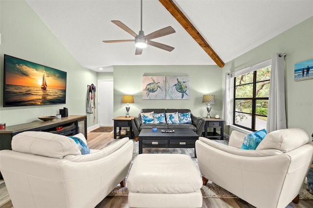 living room with hardwood / wood-style floors, vaulted ceiling with beams, and ceiling fan