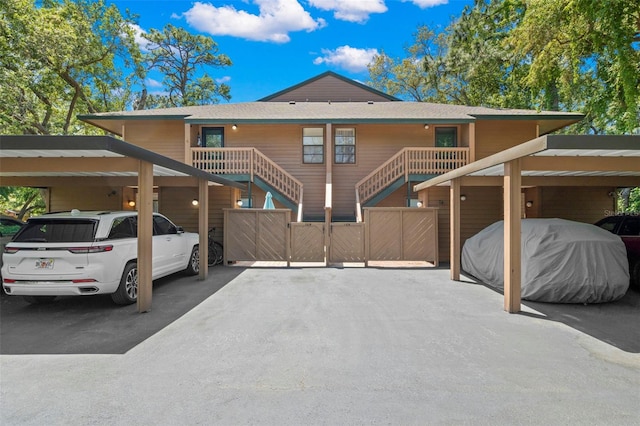 exterior space with a carport