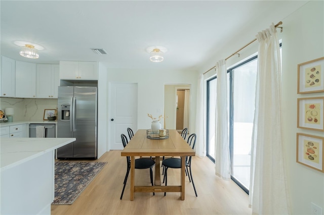 dining area featuring light hardwood / wood-style floors